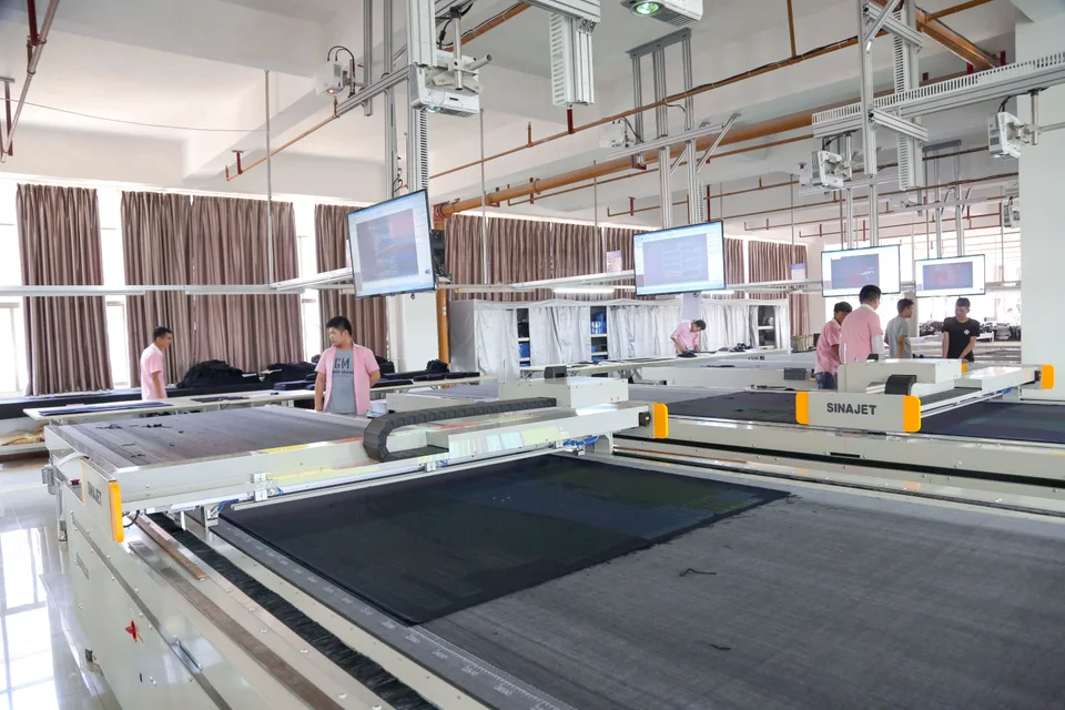 Garment cutting tables and equipment in the production workshop